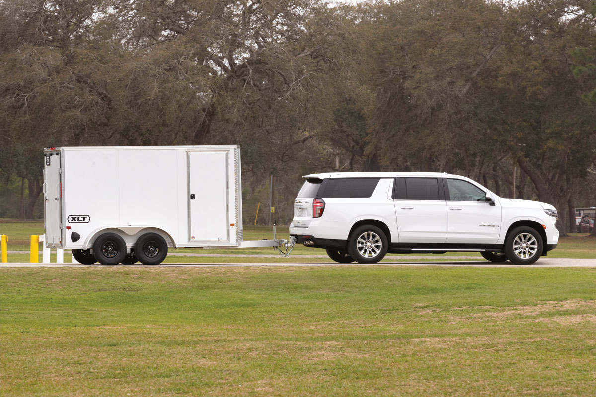 White SUV towing a 7 Wide XLT Pro Trailer